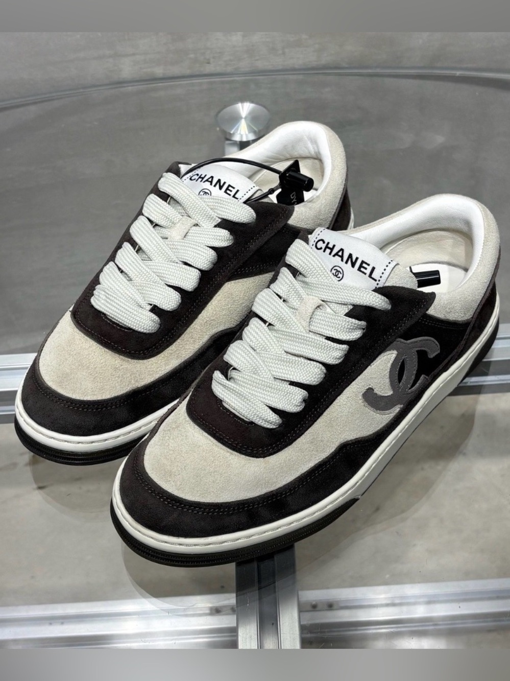CHANEL Men’s Black and White Suede Low-Top Sneakers